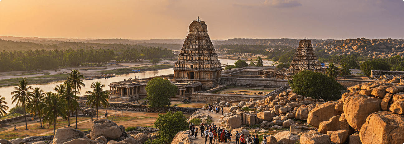 A panoramic view of the Virupaksha Temple in Hampi, Karnataka, during sunset.